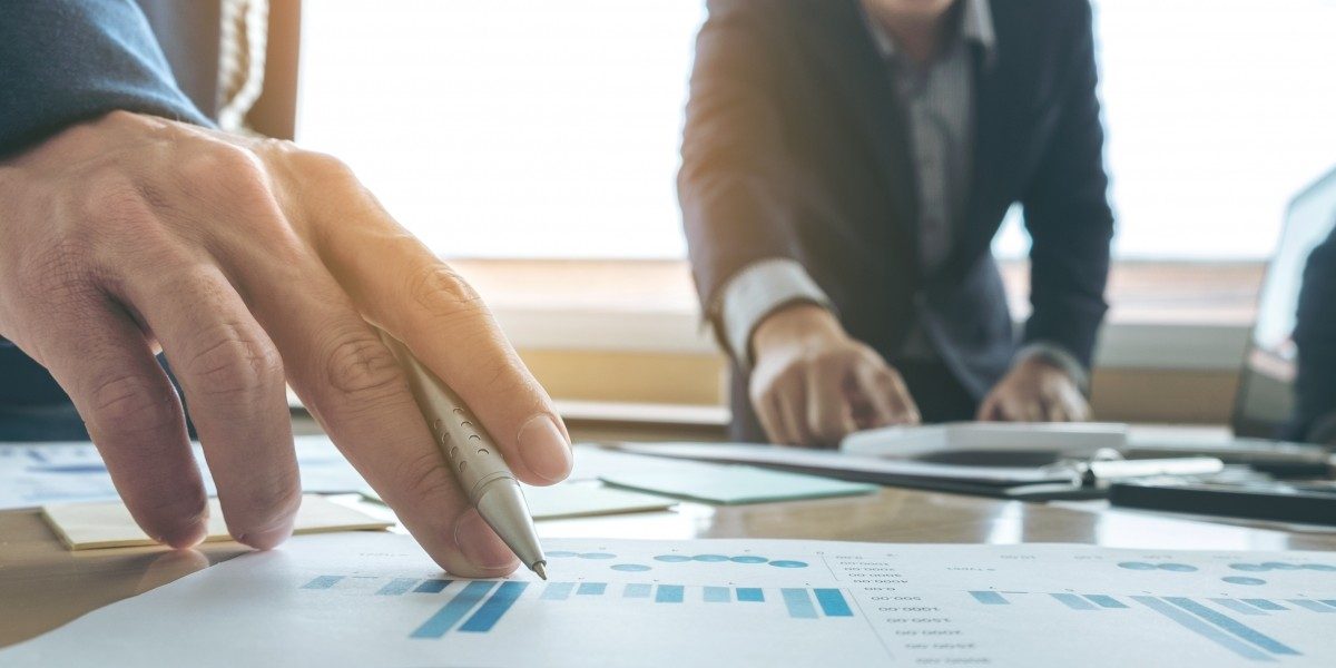 business people looking at paperwork